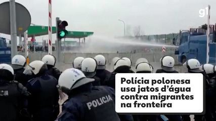 Polish police use water jets against migrants at the Belarus border